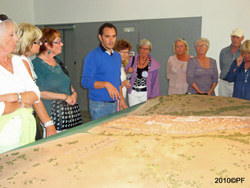The Guide showing a model of Bolonia