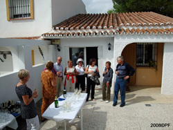 Guests mingling with the Casita in the background