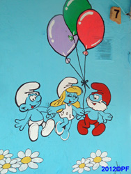 Walls are decorated with smurfs